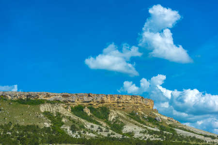 Beautiful landscape of White Rock or Belaya Scala, Rock Aq Kaya, Crimea, Belogorsky District on blue sky background.の写真素材