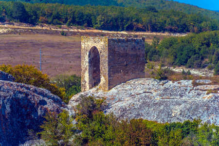 Ancient stone caves in a town-fortess Eski-Kermen high in a rocky mountains, Crimea. Top view.の写真素材