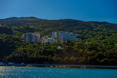 Yalta, Crimea 09/20/2021 Buildings on the shore. Boat trip from Yalta to Gurzuf.の写真素材