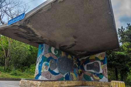 Crimea, 05/15/2021 An old Soviet-era bus stop on a road in Crimea.のeditorial素材