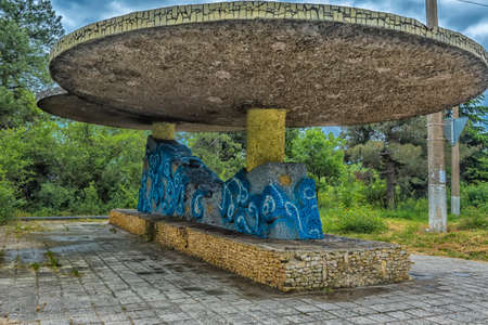 Crimea, 05/15/2021 An old Soviet-era bus stop on a road in Crimea.のeditorial素材