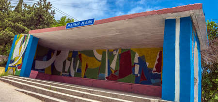 Crimea, 05/15/2021 An old Soviet-era bus stop on a road in Crimea.のeditorial素材
