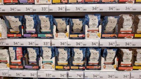 Russia. St. Petersburg 20.01.2022 Cat food for sale in the supermarketのeditorial素材