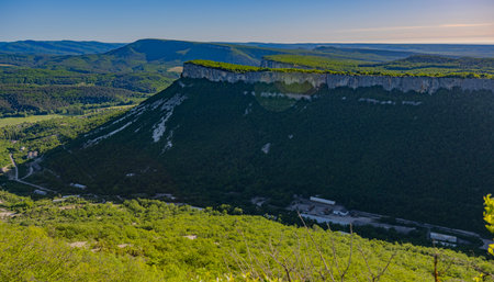 Spring landscape of the Crimean mountains, view of the Kyz-Kermen plateau in the Kachinsky valley of the Bakhchisarai district.の写真素材