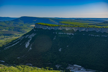 Spring landscape of the Crimean mountains, view of the Kyz-Kermen plateau in the Kachinsky valley of the Bakhchisarai district.の写真素材