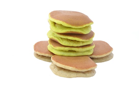 A stack of three plain pancakes on a white backgroundの写真素材