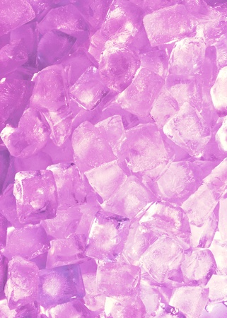 background with ice cubes in Pink lightの写真素材