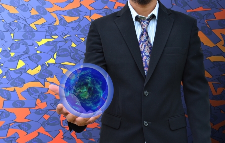 businessman holding business worldの写真素材