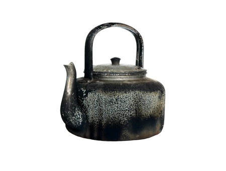 Old kettle on a white background の写真素材