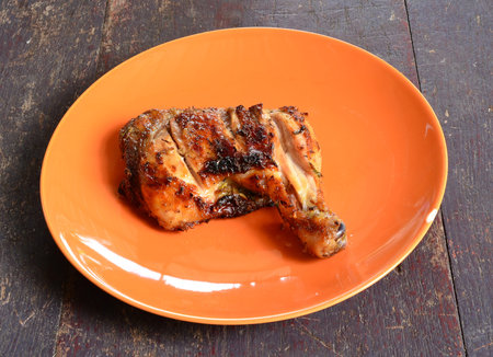 Roasted chicken on a plate.の写真素材