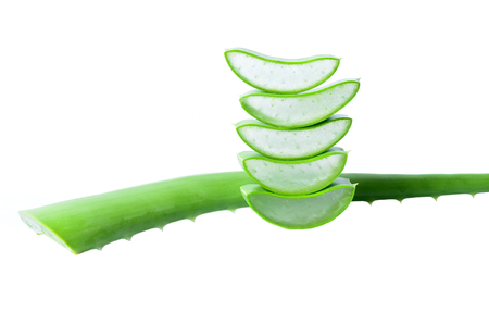 Sliced aloe leaves isolated on white の写真素材