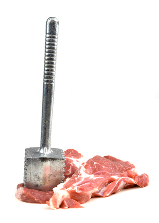 pork with a meat hammer isolated on whiteの写真素材