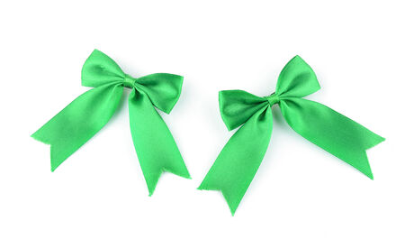 Green bow tie isolated on white backgroundの写真素材