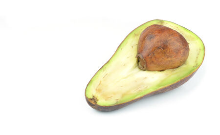 Fresh avocado isolated on whiteの写真素材