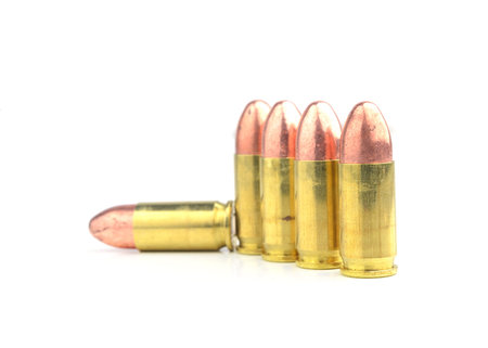 9mm bullet for a gun isolated on white background.