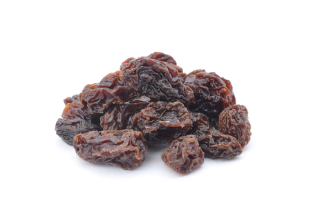 Dried raisins on a white backgroundの写真素材