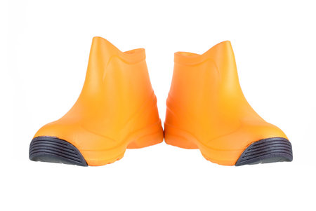 Orange boots isolated on white background.の写真素材