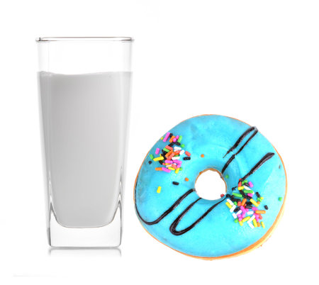 Glass of milk isolated on whiteの写真素材