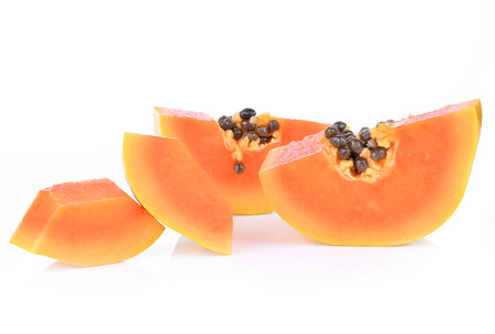 slices of sweet papaya on white backgroundの写真素材
