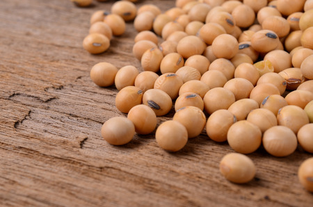 Soybeans on old wood backgroundの写真素材