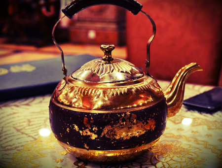Close up of bronze tea pot