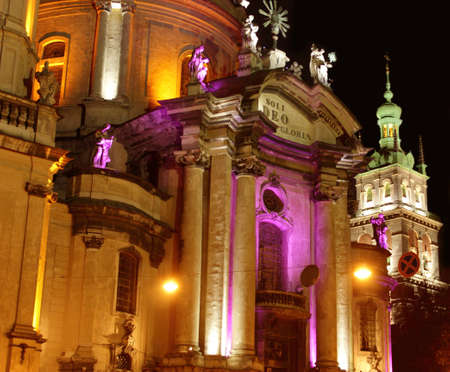 Illuminated facade of Dominican church in historical Lvivの写真素材