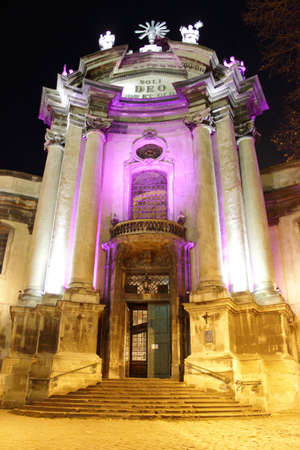 Illuminated facade of Dominican church in historical Lvivの写真素材