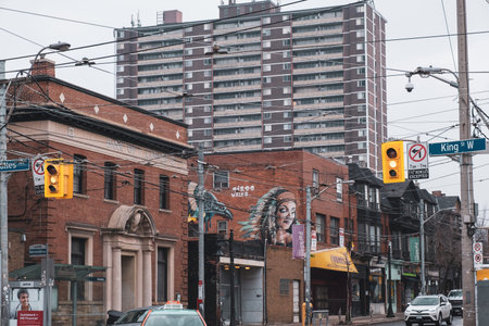 Toronto, ON Canada 12/27/19: Street scene looking into the Parkdale neighbourhood. A bleak apartment...