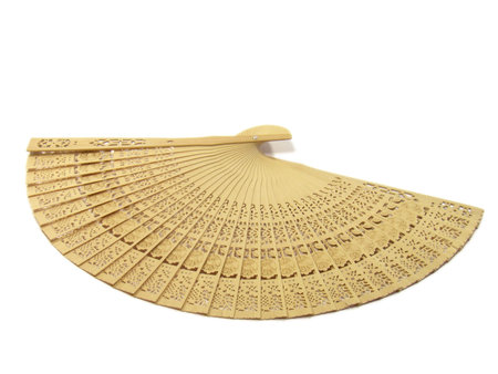 Wooden hand fan isolated on a white background.の写真素材