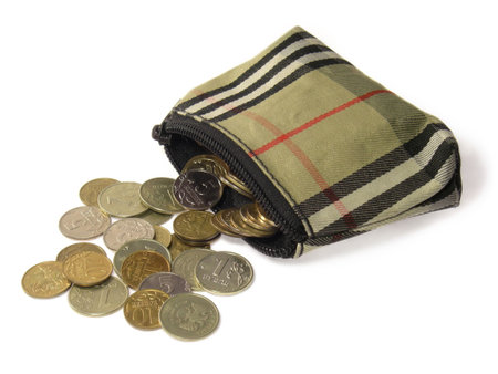 Wallet with lots of coins isolated on white background.の写真素材