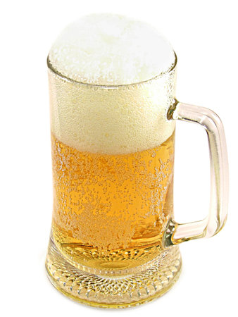 Mug of lager beer with froth isolated on white background.の写真素材