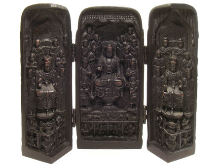 Antique Chinese religious figurine isolated on white background.の写真素材