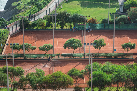 Tennis court in the parkの写真素材