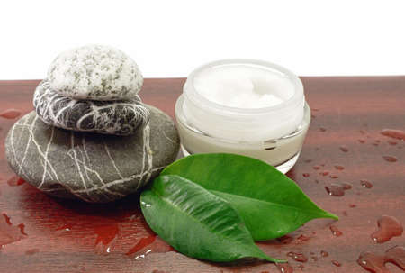 Spa stones and cosmetic cream therapy harmonyの写真素材