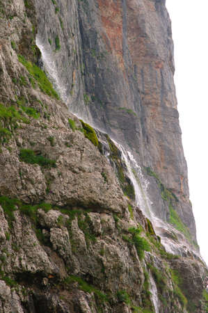 Waterfall in rocky Mountains Caucasus High view sidewaysの写真素材