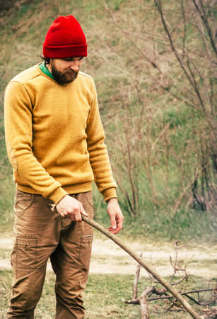 Man Traveler alone in forest survival concept Lifestyle nature on backgroundの写真素材