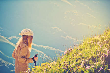 Traveler Woman mountaineering Travel Lifestyle concept Summer journey vacations outdoor mountains on backgroundの写真素材