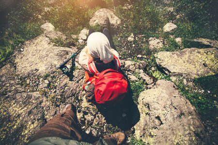 Woman with backpack and Man Travelers couple relaxing outdoor hiking Travel Lifestyle concept Summer vacations outdoor aerial viewの写真素材