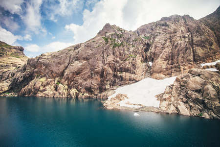 Landscape of blue Lake with Rocky Mountains Summer Travel serene viewの写真素材