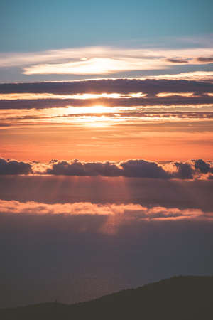 Sunset Sky over clouds Landscape Travel serene scenic view flying beautiful natural colorsの写真素材