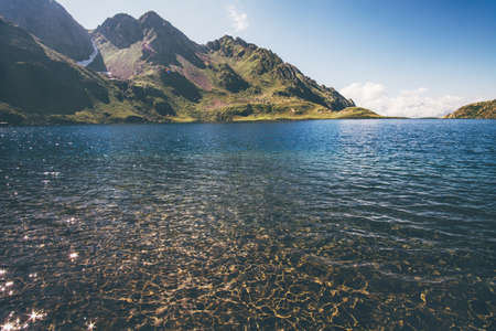 Lake and rocky Mountains Landscape Summer Travel serene scenic viewの写真素材