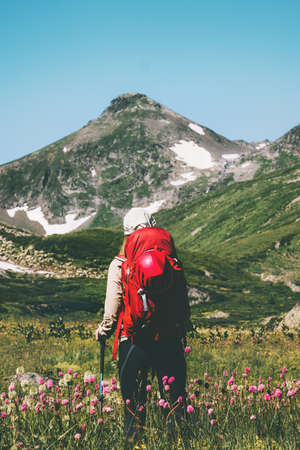 Backpacker hiking at mountains Travel Lifestyle adventure wanderlust concept summer vacations outdoorの写真素材