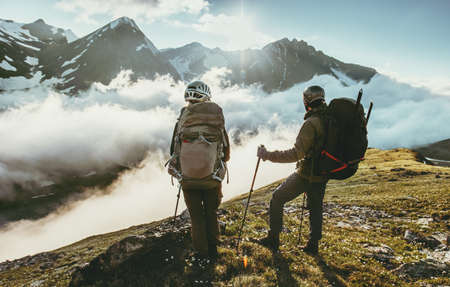 Couple travelers on mountain summit together love and Travel Lifestyle wanderlust concept adventure vacations outdoor
の写真素材