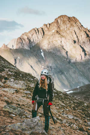 Woman climbing in mountains traveling Lifestyle survival concept adventure outdoor active vacations sport wild nature の写真素材