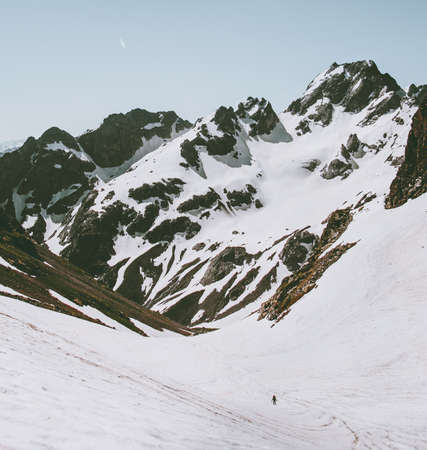 Rocky Mountains and climber man on glacier Landscape Travel adventure concept vacations getaway outdoorの写真素材