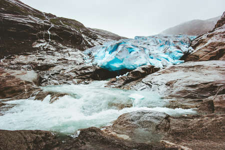 Nigardsbreen glacier and river in Norway Mountains global warming ecology conceptの写真素材