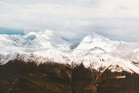 Snowy mountains peaks range landscape Travel aerial view wilderness nature sceneryの写真素材