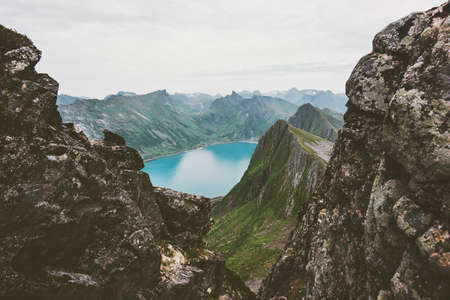 Mountains over fjord landscape in Norway aerial view Travel vacations scenic Senja islands の写真素材