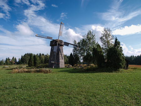 Historic wooden windmill in southern Finland in grassy sceneryの写真素材