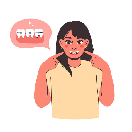 Portrait of a joyful young woman with long dark hair smiling broadly to show her teeth with orthodontic bracesのイラスト素材